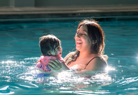 Lady and baby in the pool