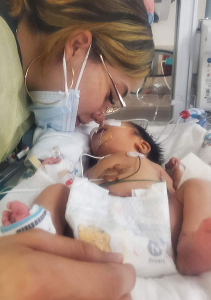 mother and baby in nicu