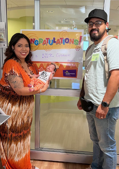 Baby Hosanna and her parents after she was discharged from the hospital