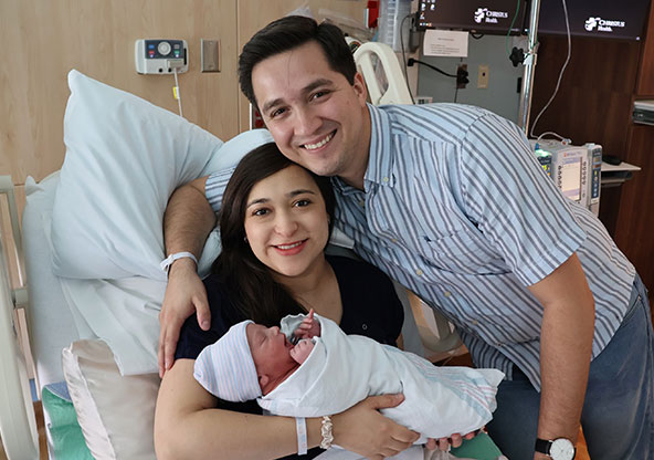 New Happy Parents Cecilia and Jorge and Newborn Baby Sebastian