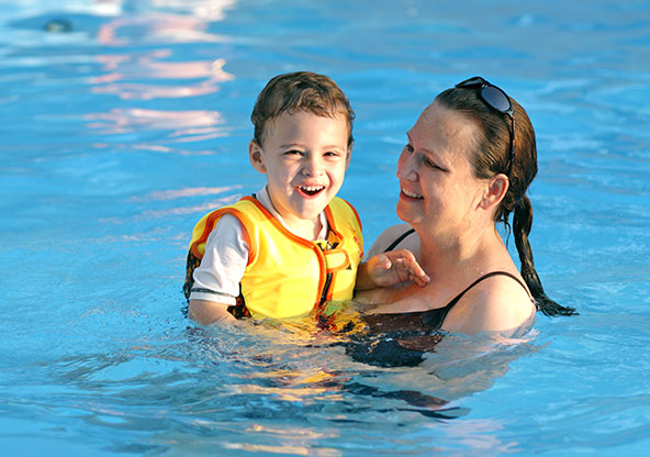 Child and mom in pool