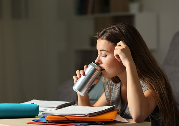 Teen with energy drink