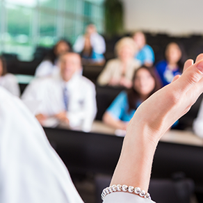 A physician teaching class