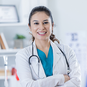 A Hispanic female doctor smiling