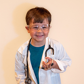 Little boy dressed up as a doctor