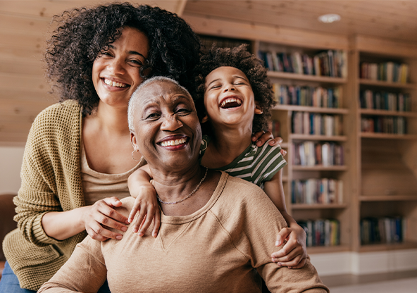 Three generations of women hugging each other