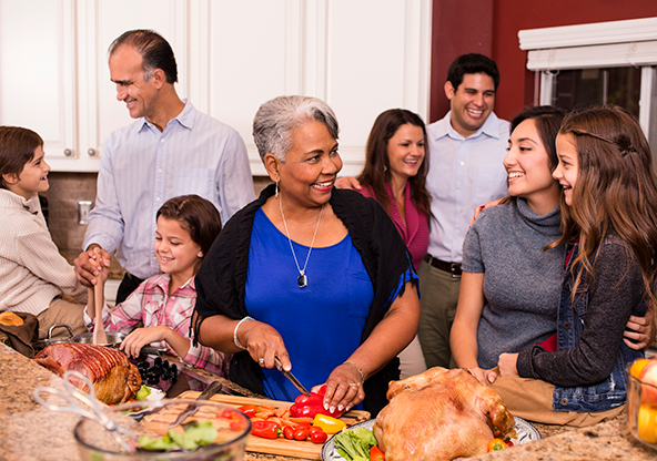 A multi-ethnic family celebrating from grandma's successful heart procedure
