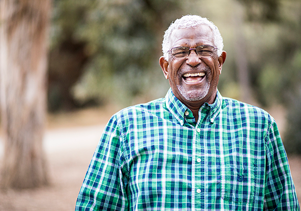 A senior African-American smiling that may have congenital heart disease