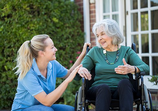 A caregiving with a senior female who has Guillain-Barré Syndrome