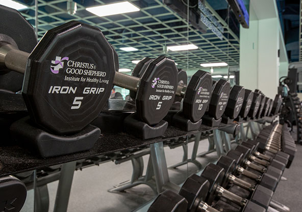 A rack of free weights at the CHRISTUS Institute for Healthy Living