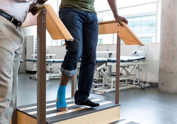 Man does rehab with a hurt ankle