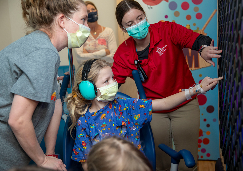 Patients enjoying the Child Life Zone with Child Life Specialist at The Children's Hospital of San Antonio