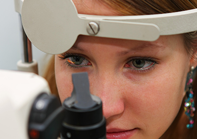 Young woman getting an eye exam